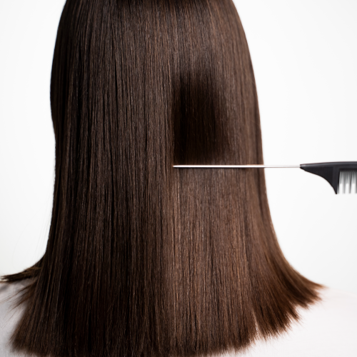 Cabello sedoso y alineado después de terapia en Blue Capilar Cali