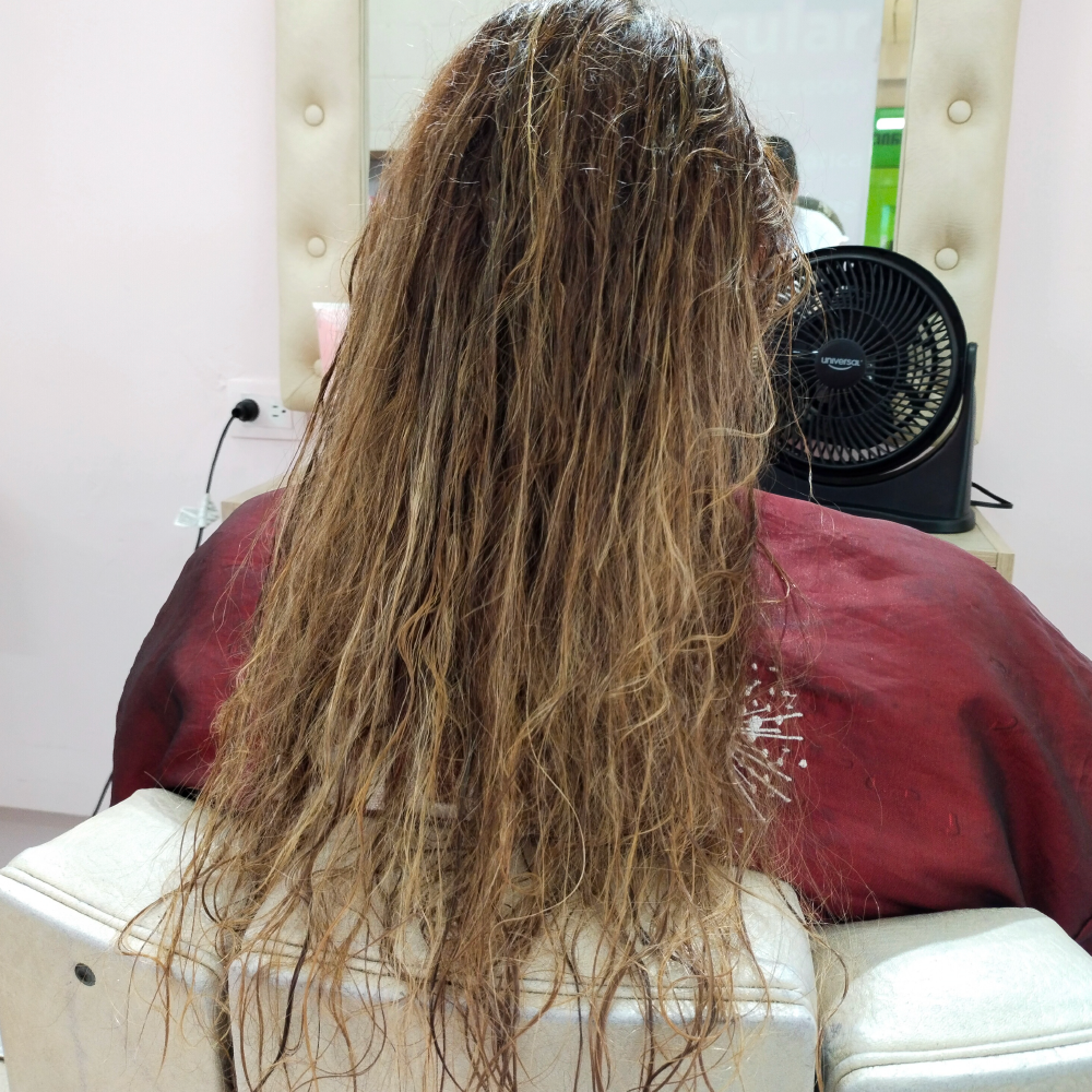 Cabello antes de alisado en Blue Capilar Cali